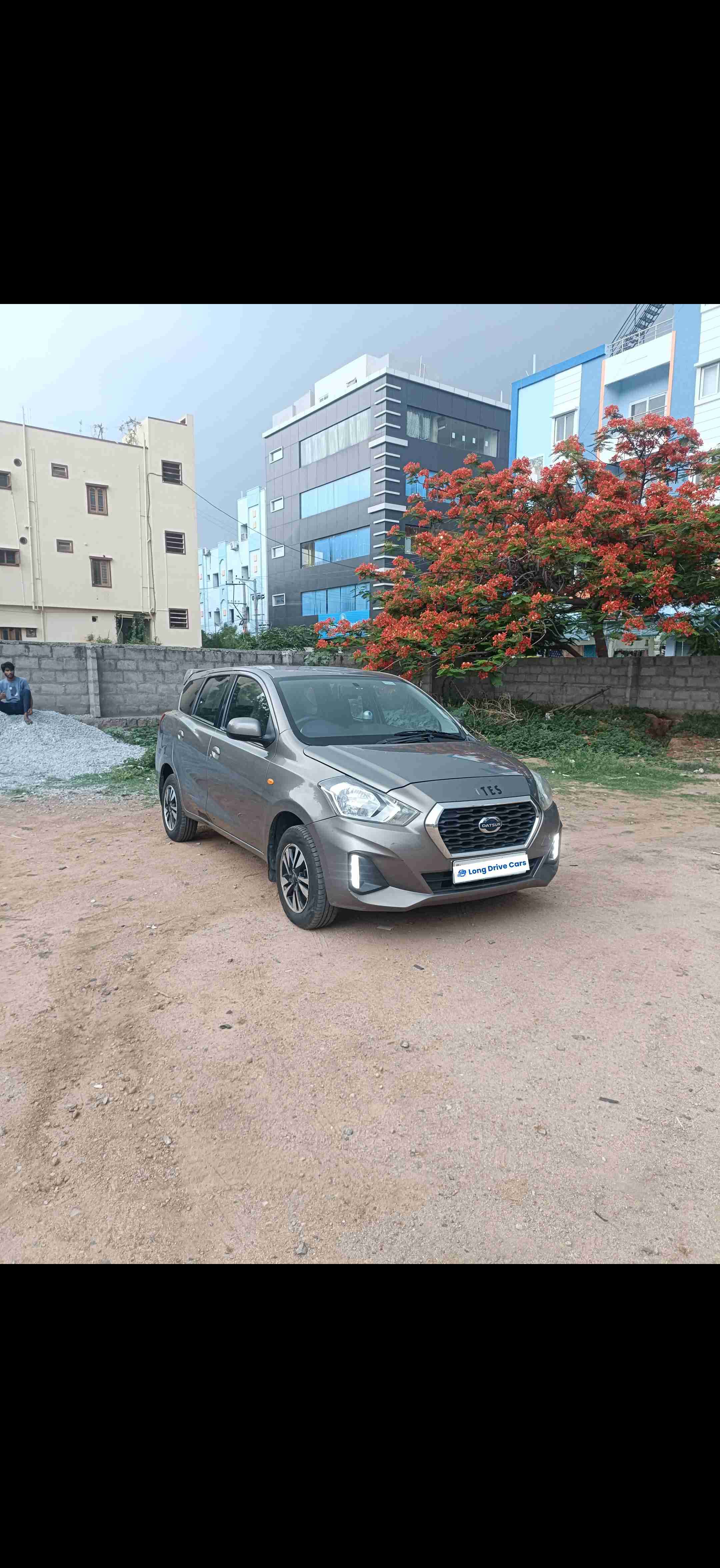 self drive car rental datsun go plus